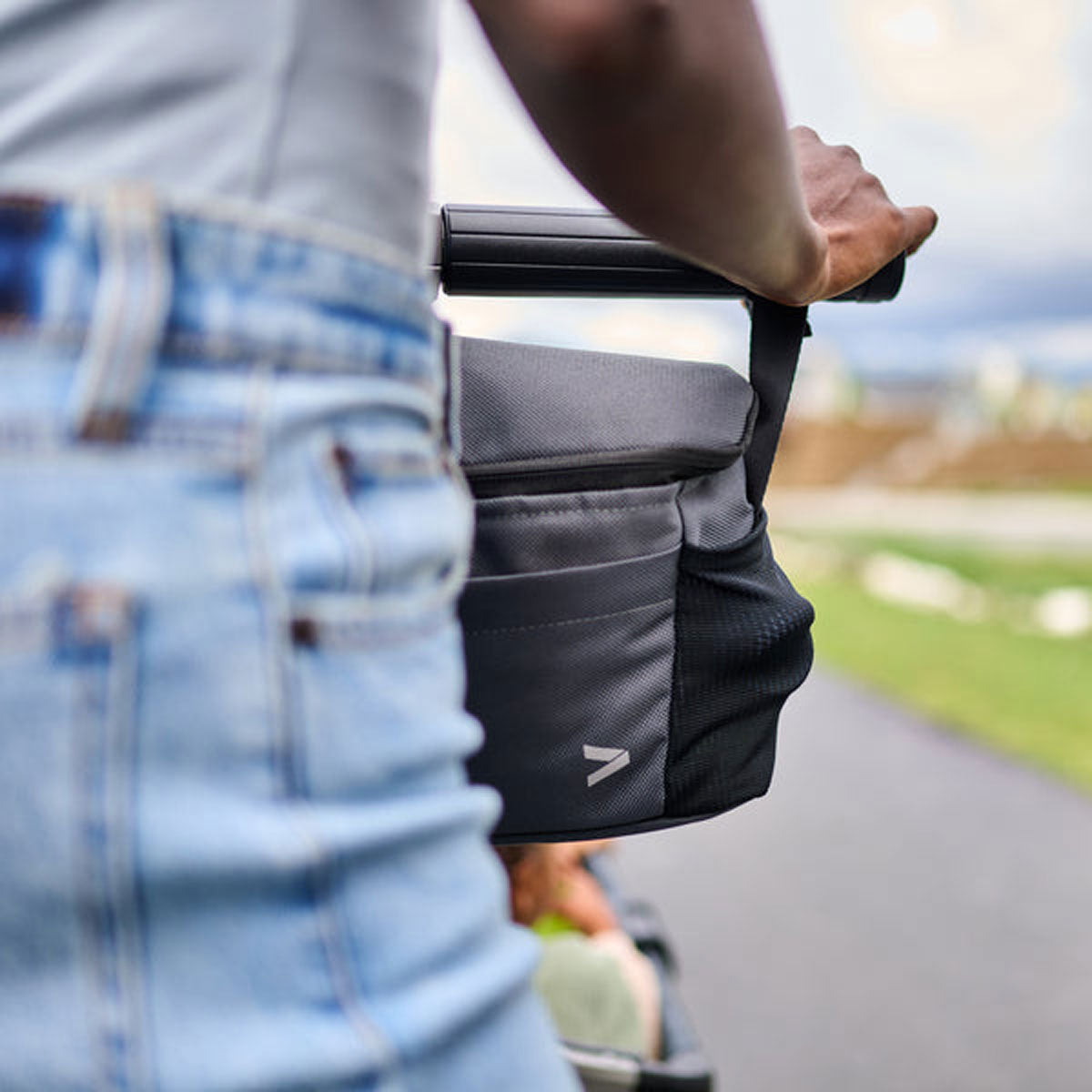 Mom pushes Cruiser with attached Veer Parent Organizer - Gray Granite