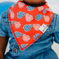 Baby wearing Copper Pearl Single Holiday Bandana Bib- Spangled Sunglasses