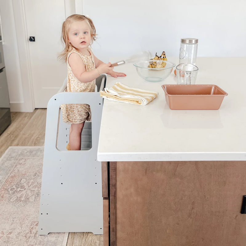 Girl standing on Dadada Toddler Tower - Light Gray