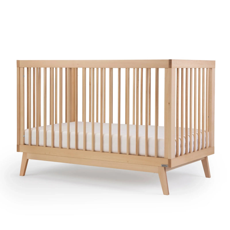 Baby sleeping in Dadada Soho 3-in-1 Convertible Crib - Natura;