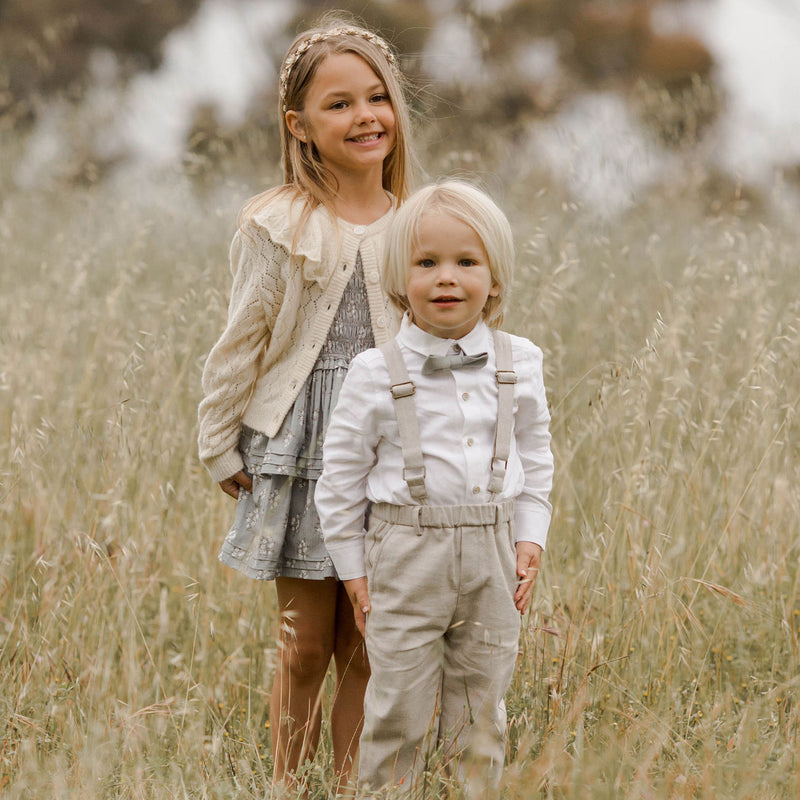 Boy wearing Noralee Suspender Pant - Fog stands next to girl