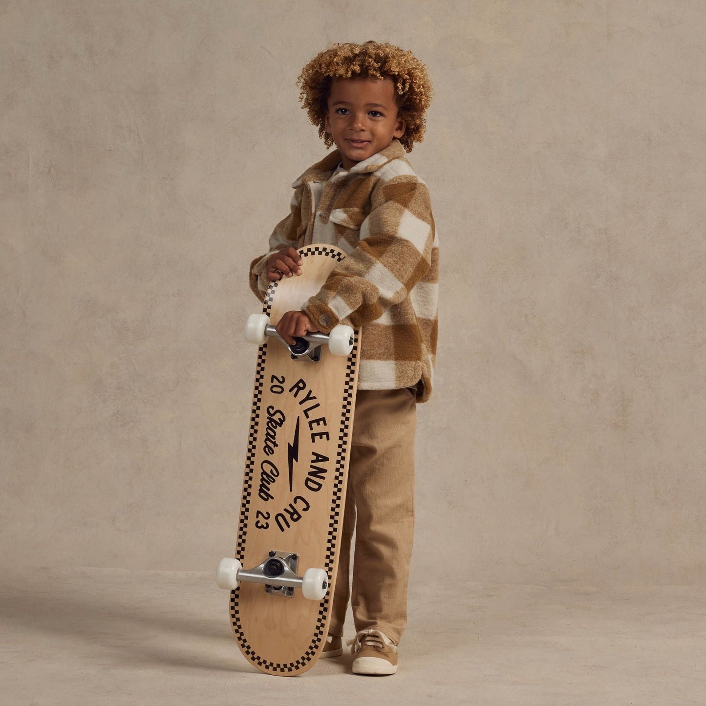 Boy wearing Rylee and Cru Shearling Chore Coat - Brass Checker