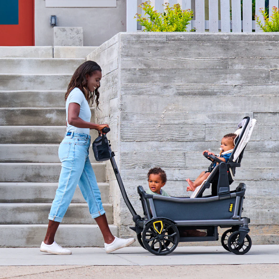 mom pushing kids in Veer Cruiser City