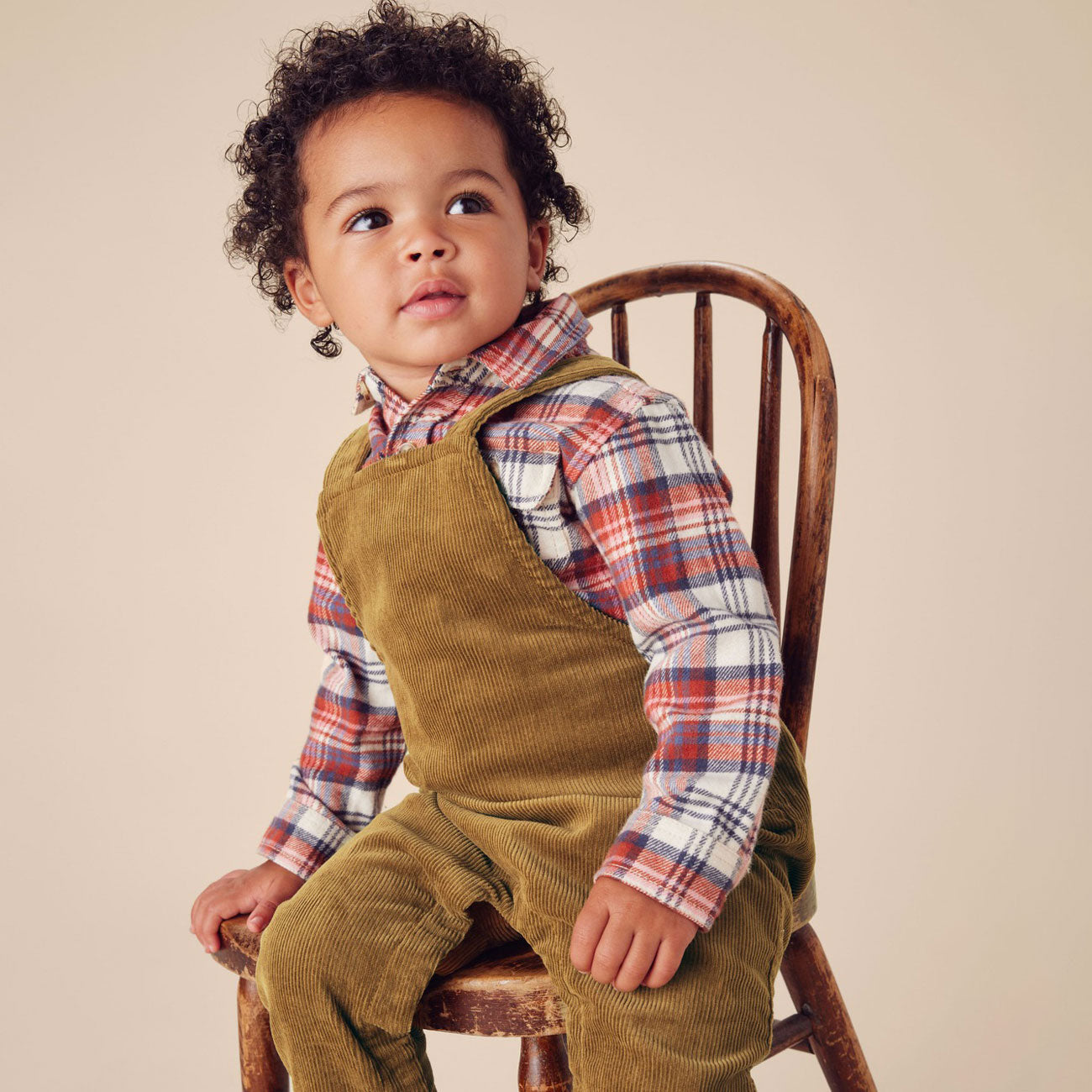 Little boy wearing Tea Collection Corduroy Baby Overalls - Raw Umber