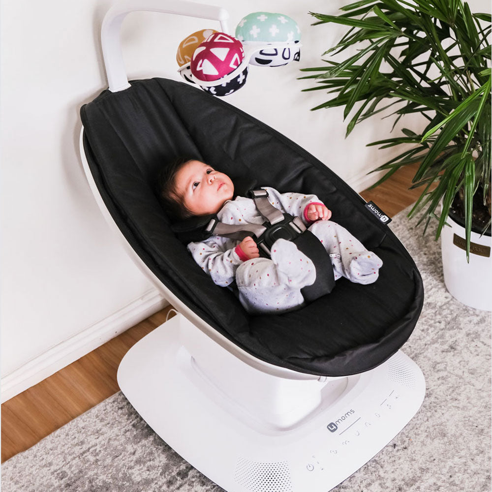 Baby in 4moms mamaRoo 5 - Multi-Motion Baby Swing - Black