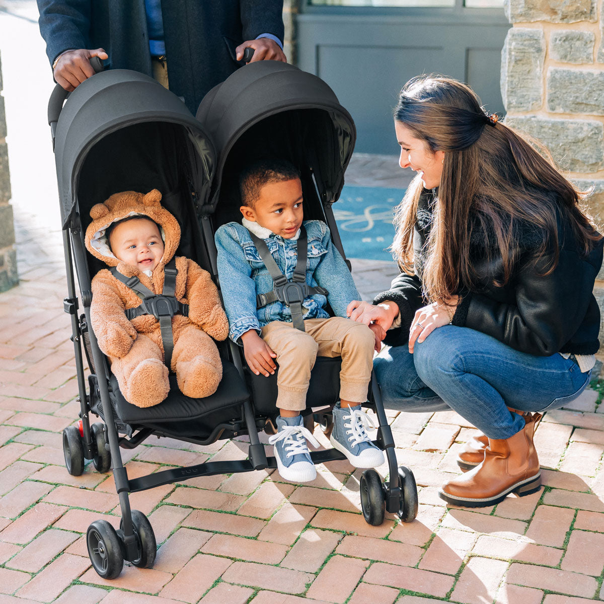 A baby and toddler ride in UPPAbaby G-LINK V2 Stroller - Jake