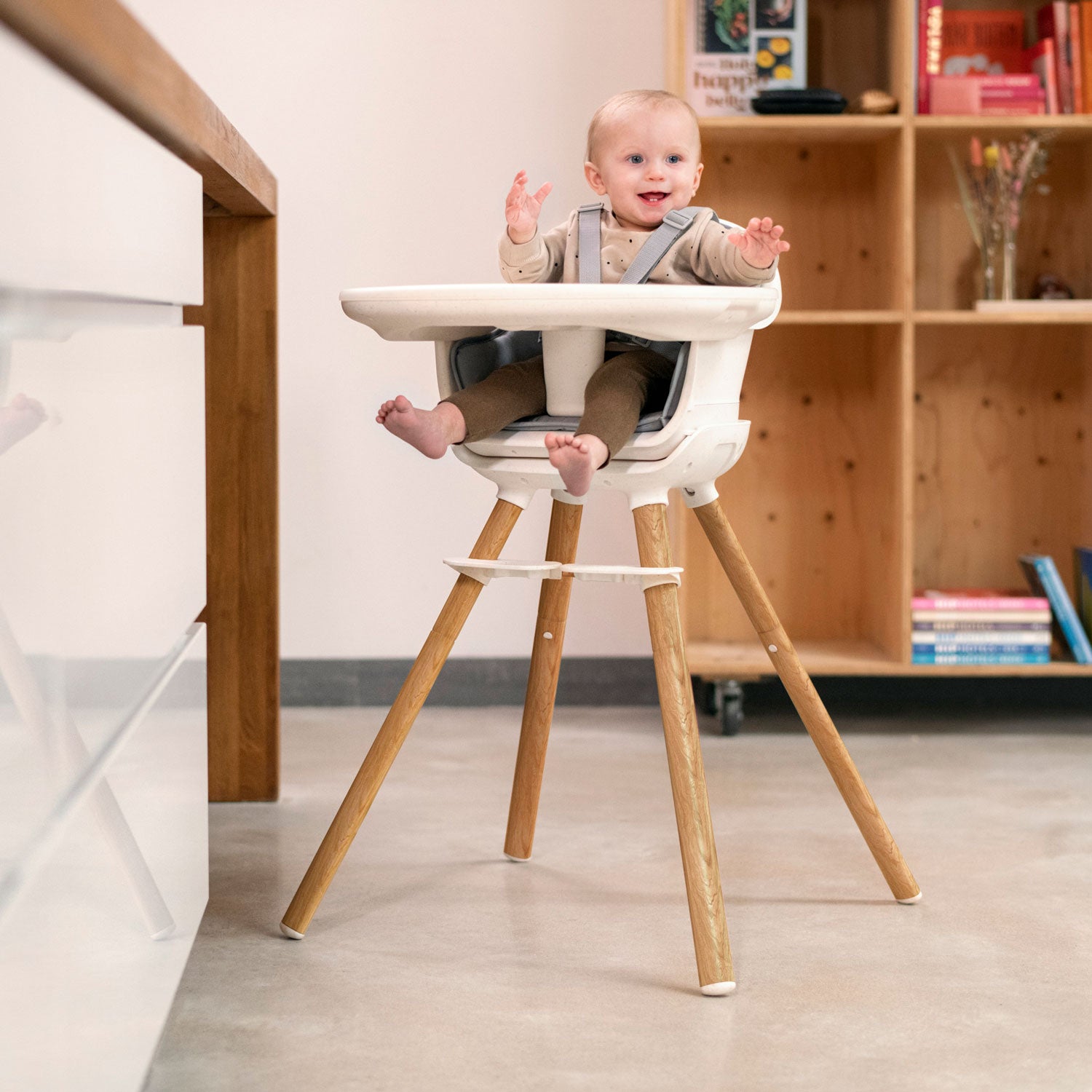 Baby sitting in Maxi-Cosi Moa 8-in-1 High Chair