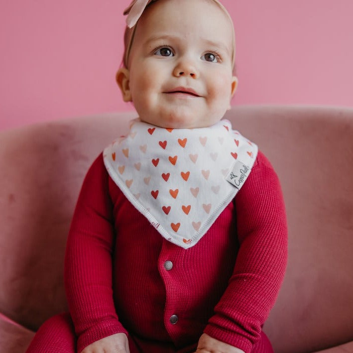 Baby wearing Copper Pearl Single Holiday Bandana Bib - Cupid